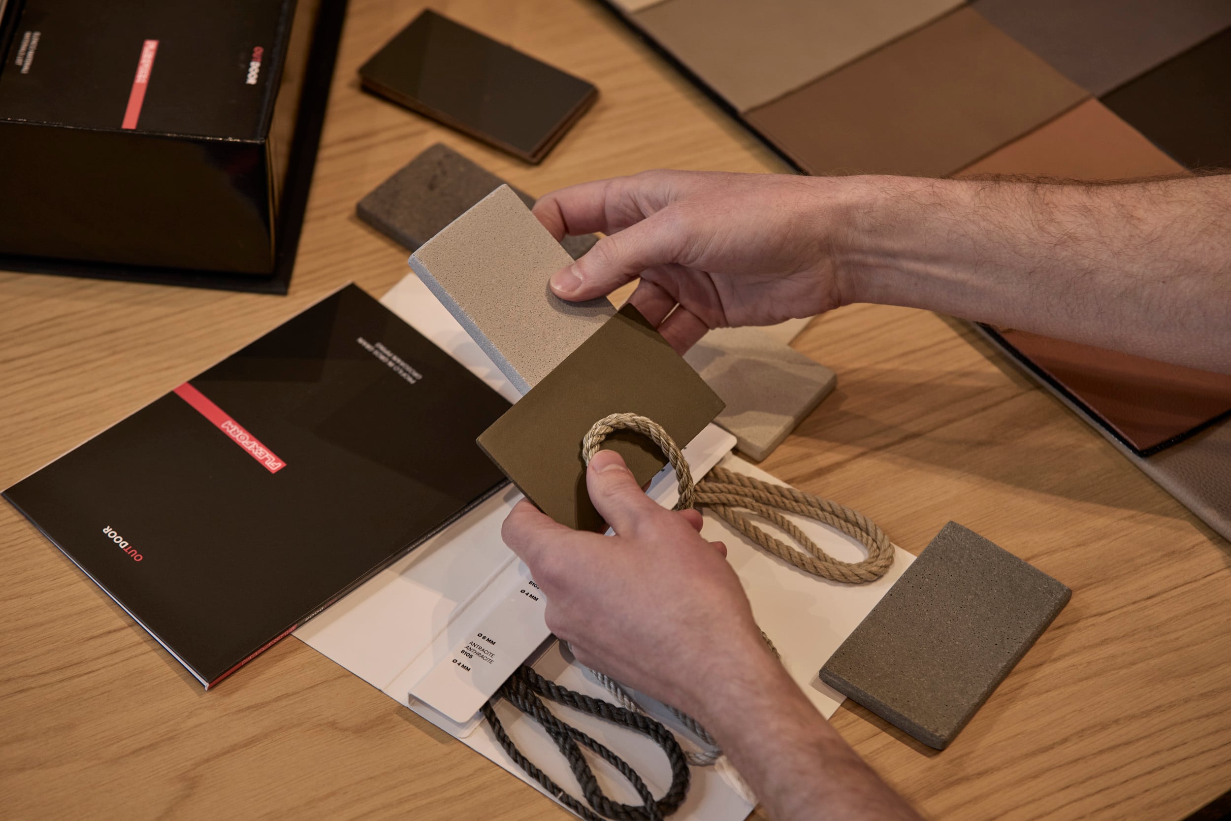 Fabric and leather samples on the selection table